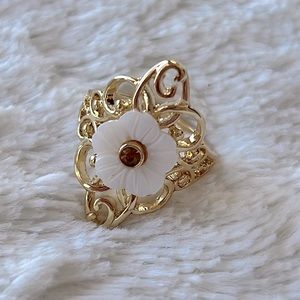 Gold Tone Ornate Ring with a White Flower